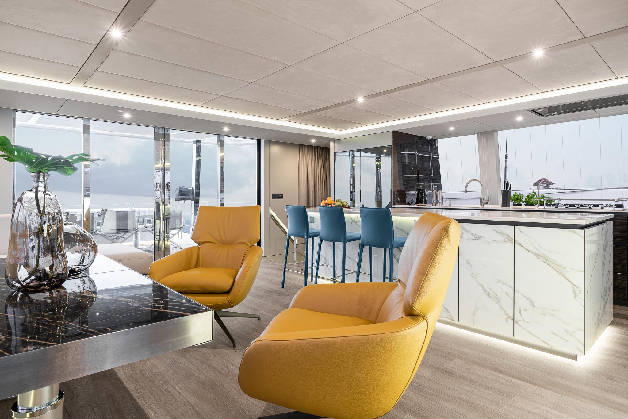 Sunreef 80 saloon with marble galley and panoramic glazing