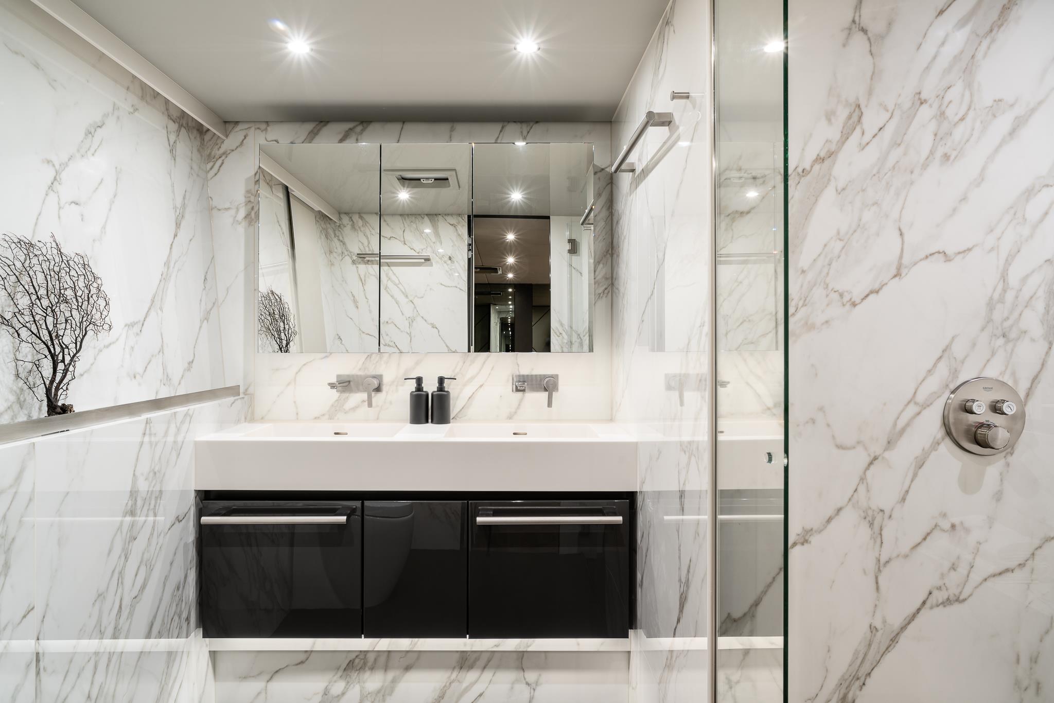 Full marble en-suite bathroom with double vanity